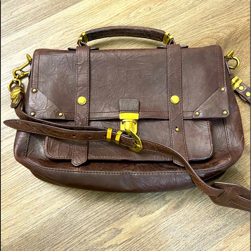 It’s NWT Oryany Large Flap Satchel